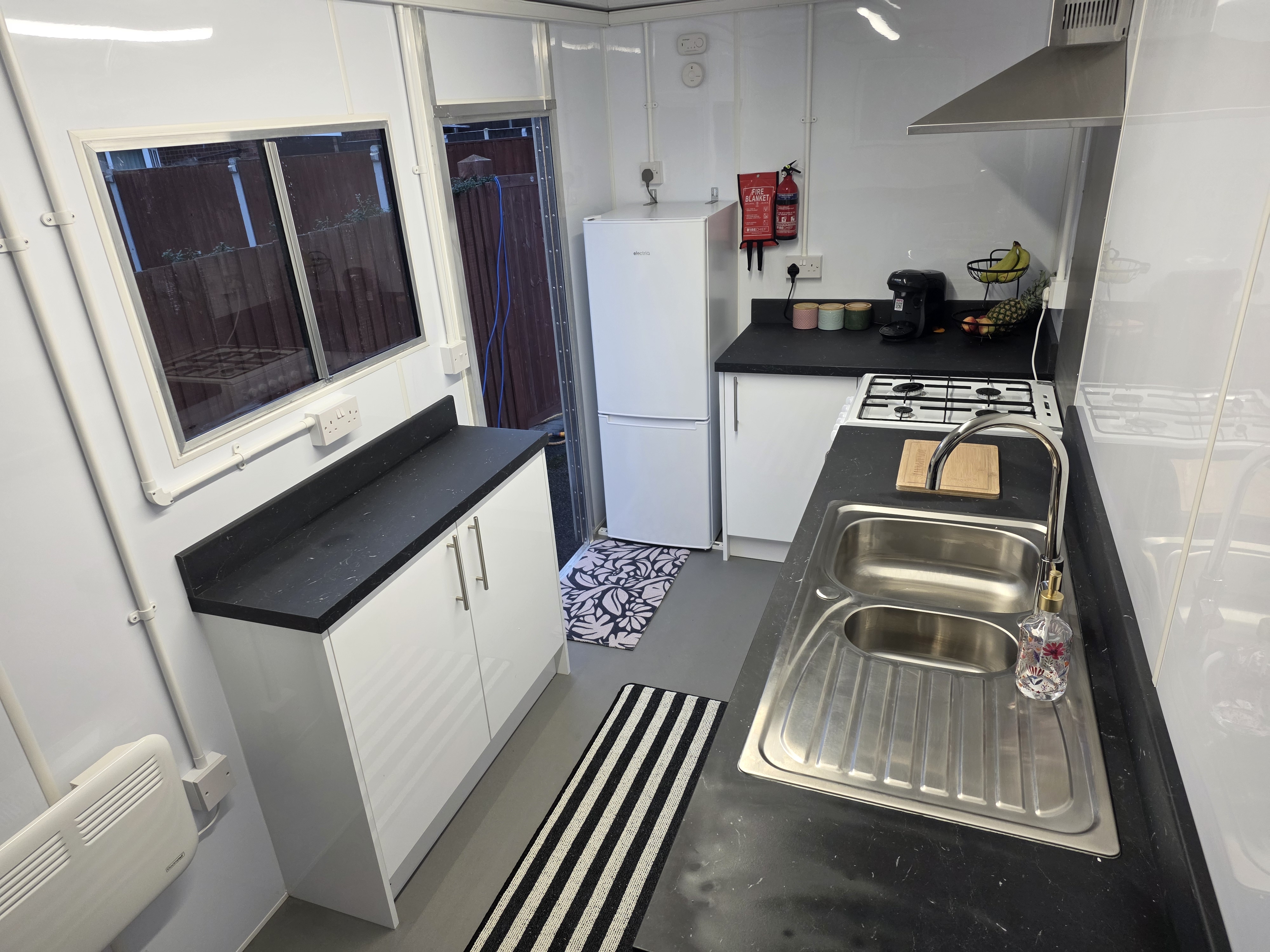 Kitchen pod — sink and worktop close-up