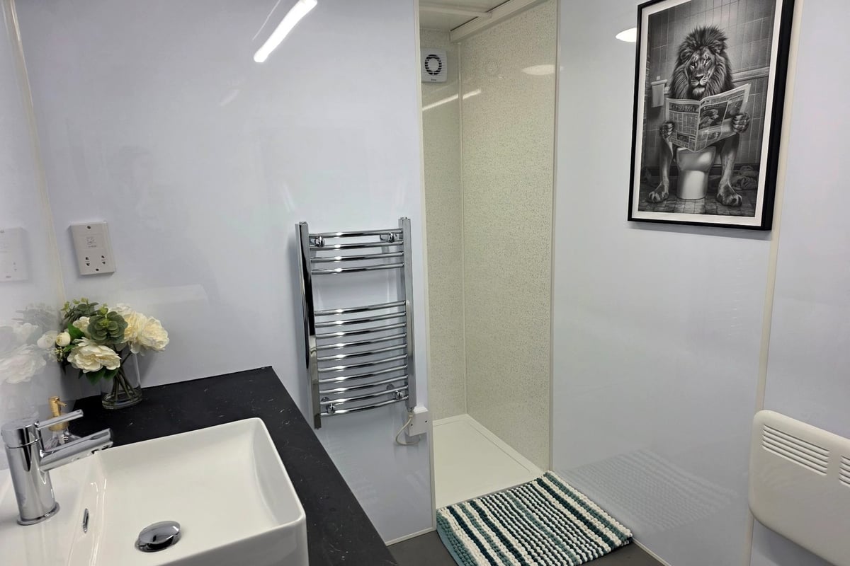 Fully equipped temporary bathroom pod interior